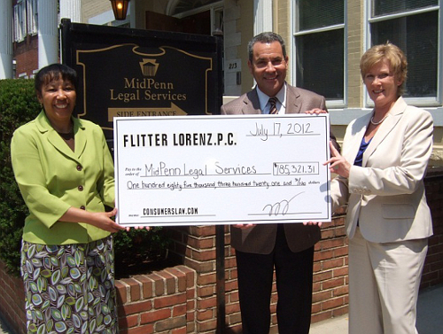 Rhodia Thomas of MidPenn Receives Check from Cary Flitter, Esq. Consumer Attorney Nancy Datres is also pictured.